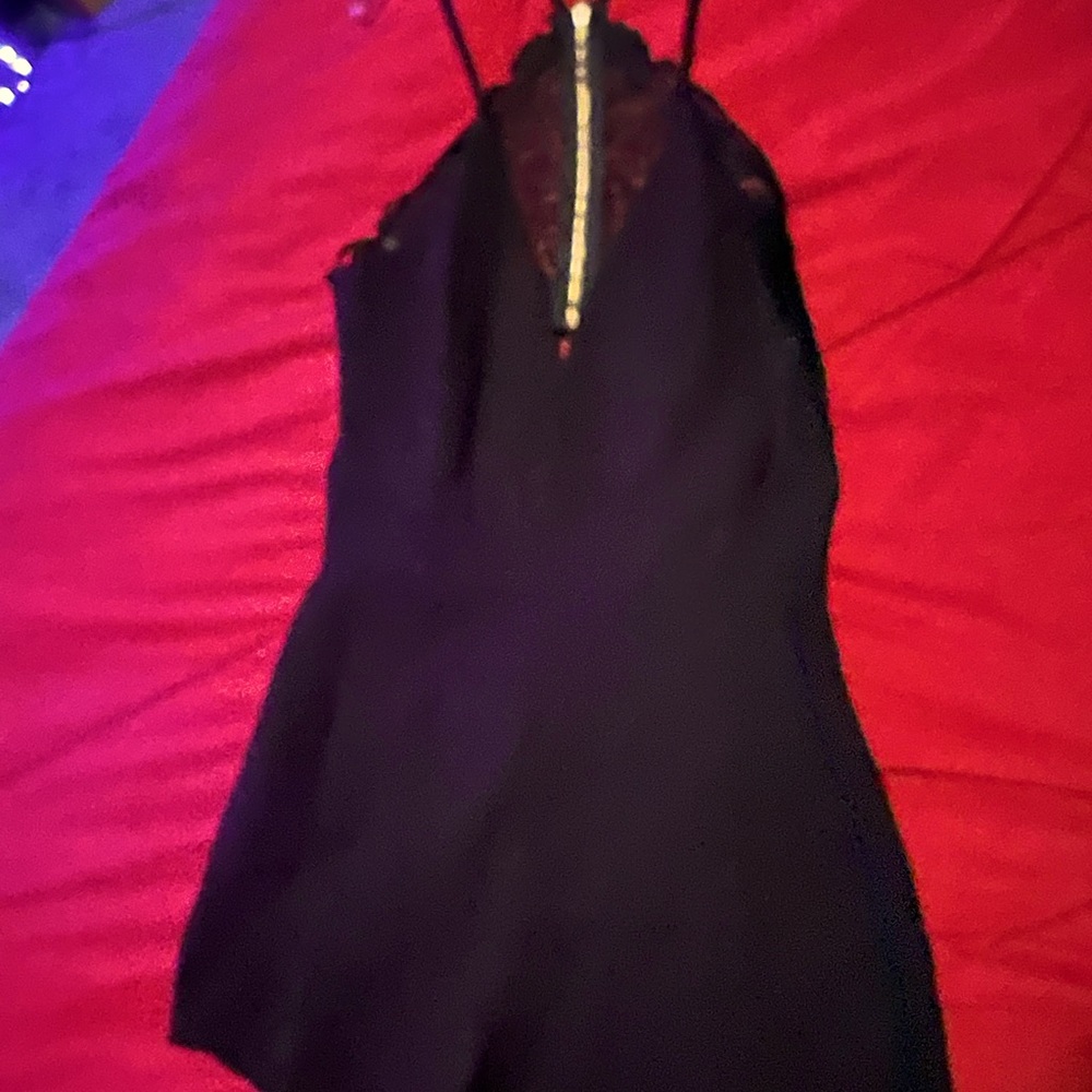 Black romper with laced zip up back